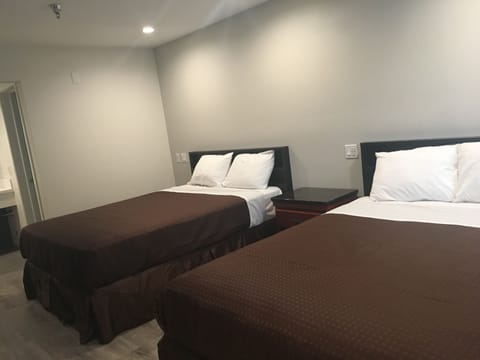 Room, 2 Queen Beds | Desk, soundproofing, iron/ironing board, free WiFi