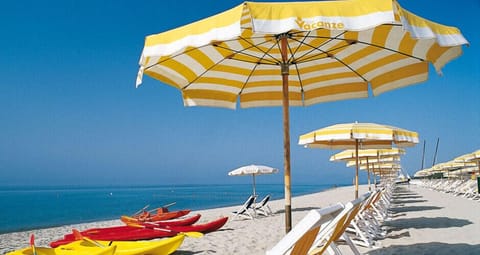 Private beach nearby, sun loungers, beach umbrellas