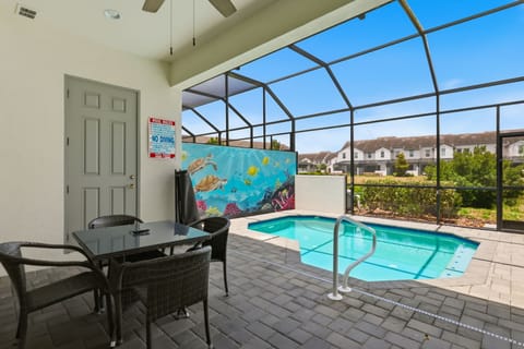 Poolside patio seating is perfect for morning coffee or relaxing after a day of adventure.