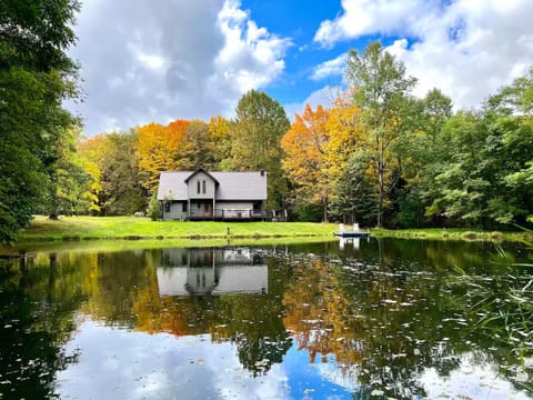 Early fall view of the house from across the pond