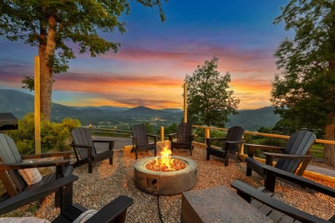 Gather around the fire pit as the sun sets over the valley — the view that makes this place unforgettable.
