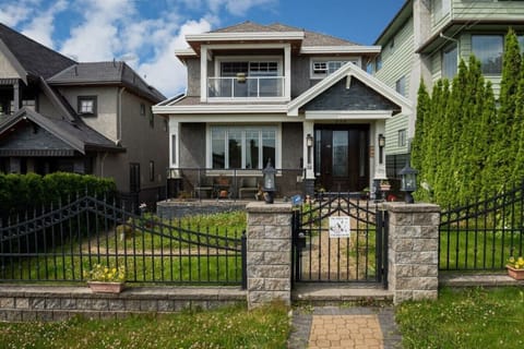 Elegant  home with charming curb appeal and private gated entry