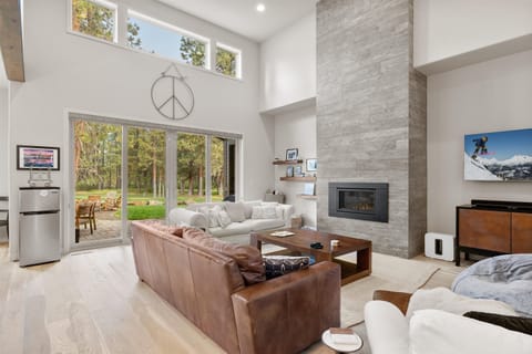 Spacious and inviting, the perfect spot to unwind after a day of adventure. Living room includes a gas fireplace and smart TV.