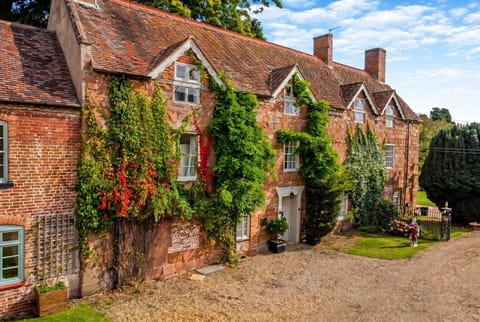Ivy-clad sandstone manor where centuries of character greet you at the door
