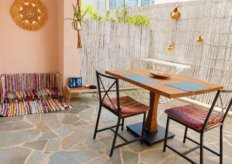 The private patio offers a relaxed outdoor setting where you can enjoy breakfast, afternoon refreshments or a quiet evening after a day by the sea.