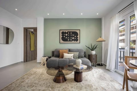 inviting living room with soft lighting and a stylish sofa, offering a comfortable space to unwind.