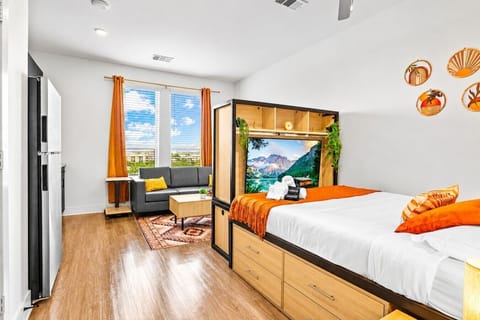 Wake up refreshed in a cozy queen bed designed for comfort after a busy day exploring the city.