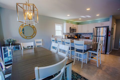 Dining Area with Seating for 7 at the Table and 5 at the Bar.