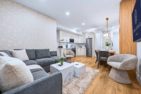 Open plan space made for easy living, blending comfort, dining, and entertainment for a relaxed and effortless stay experience