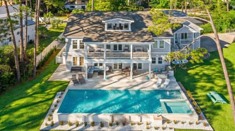 Aerial view of the pool, hot tub, and decks.
