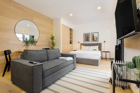 Bright open-concept living area with Smart TV