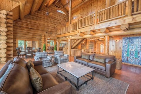 Main level living opens to dining areas and kitchen.