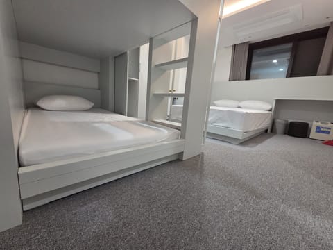 Standard Quadruple Room | Down comforters, individually furnished, free WiFi