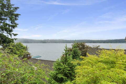 Enjoy a beautiful partial lake view surrounded by lush greenery, creating a peaceful and relaxing atmosphere during your stay.