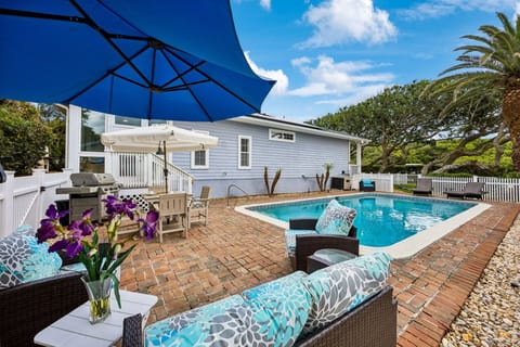 Plenty of outdoor furniture by the pool including 2x chaise lounges, 2x wicker love seats, and outdoor dining table for 4. Additionally, we have a propane grill for our guests.