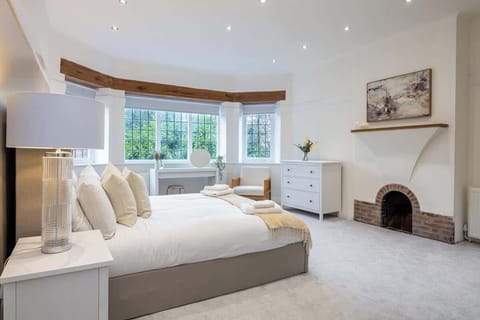 Master Bedroom with access to private dressing room and en-uite with freestanding bath and shower, along with a jack and jill sink set.