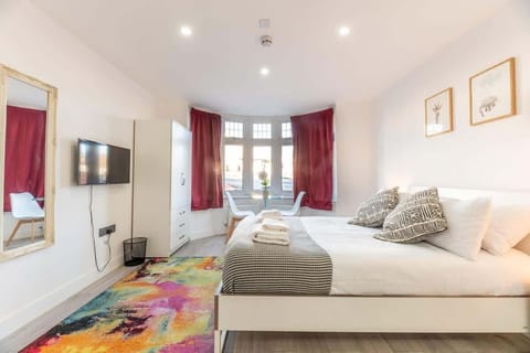 Relax in this vibrant bedroom