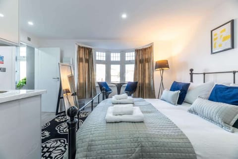 unwind in this bright and comfortable bedroom