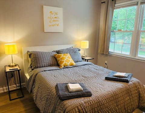 Bedroom 1 - Bright and airy with a large window bringing in natural light