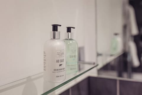 Hair dryer, towels, soap, shampoo