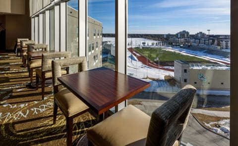 Scenic view of the nearby campus athletic fields and university buildings.