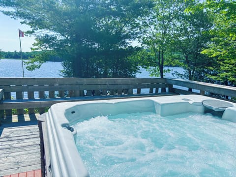 View across the property and lake from the hot tub