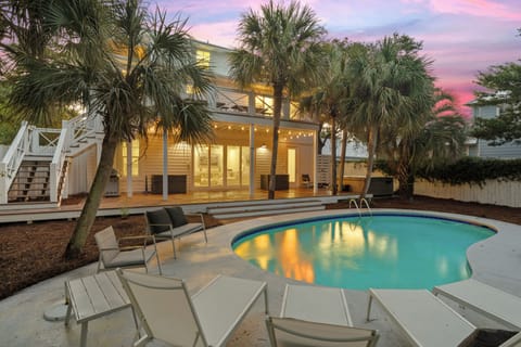 Exceptional outdoor lighting makes this home an entertainer's dream, day or night.