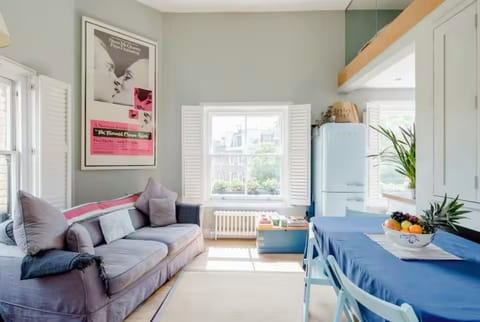 Double height and triple aspect sitting room with wonderfully light