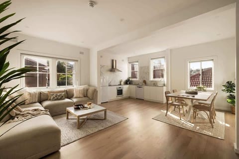 Living Room: Sun-drenched space with elegant decor, perfect for gatherings or a lazy afternoon!