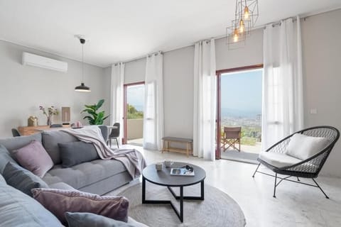 Apartment, Patio, Garden View | Living area | 50-inch Smart TV with satellite channels, Netflix, streaming services