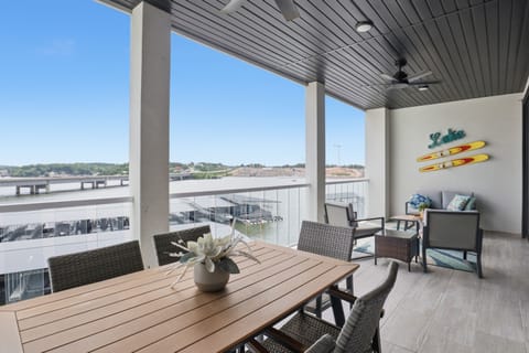 Take in the lake and pool views from Building One of Topsider Community