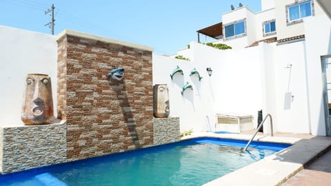 Outdoor pool, pool umbrellas, sun loungers