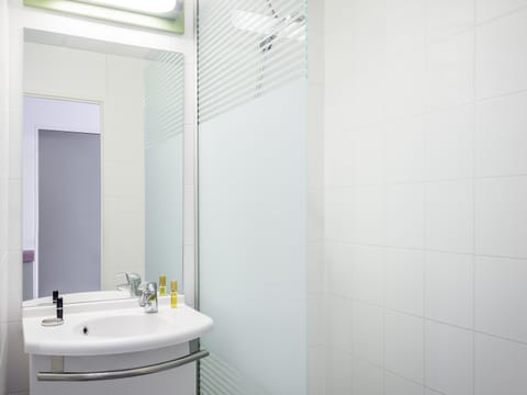 Hypo-allergenic bedding, desk, blackout drapes, soundproofing