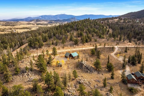 A peaceful mountain cabin surrounded by nature, just waiting for your next getaway.