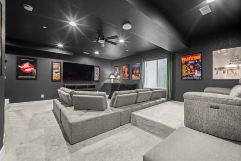 Kick back in the private theater room with oversized seating and movie nights.
