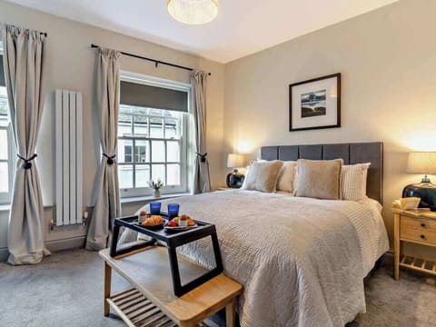King-size bed with Smart TV.