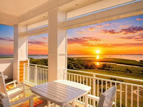Breathtaking sunset over Back Bay, best enjoyed from your private balcony with a front-row seat to nature’s daily masterpiece.