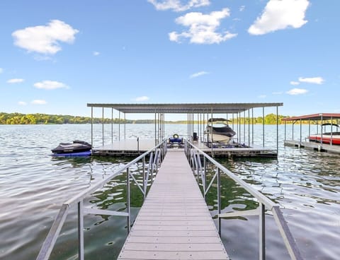 Your dock with plenty of space for guests and a slip for your boat