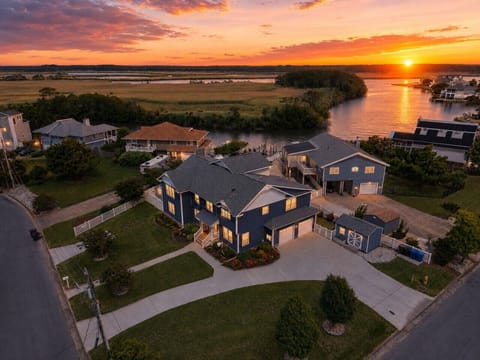 Sunsets like this are why guests return year after year. Enjoy front-row views of the bay from this one-of-a-kind waterfront retreat.
