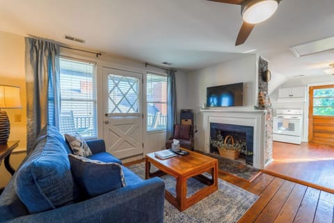 Welcome to the Historic Lovely Loft! Although the beautiful, original fireplace is unable to be used, it adds a warmth to the decor.