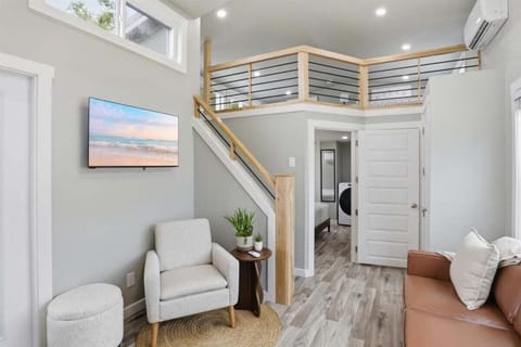 Each tiny home features an eat-in kitchen, 1 full bathroom, queen bedroom, living area, and loft with 2 queens.