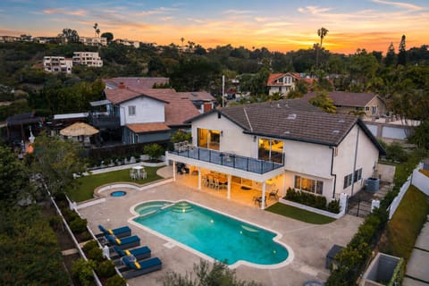 Resort-style backyard with a sparkling pool, spa, and plenty of space to soak up the California sunshine.
