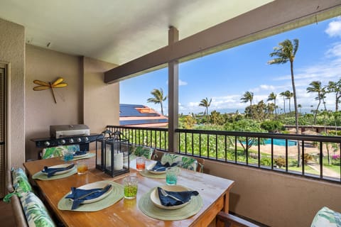 Savor open-air dining on the spacious covered lanai, where tropical breezes and golf course views set the perfect island backdrop.