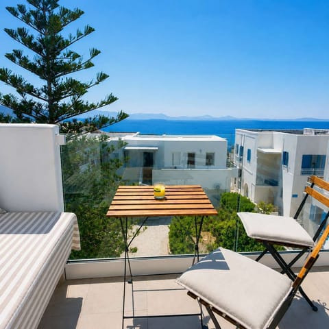 Private balcony with sea views and outdoor seating