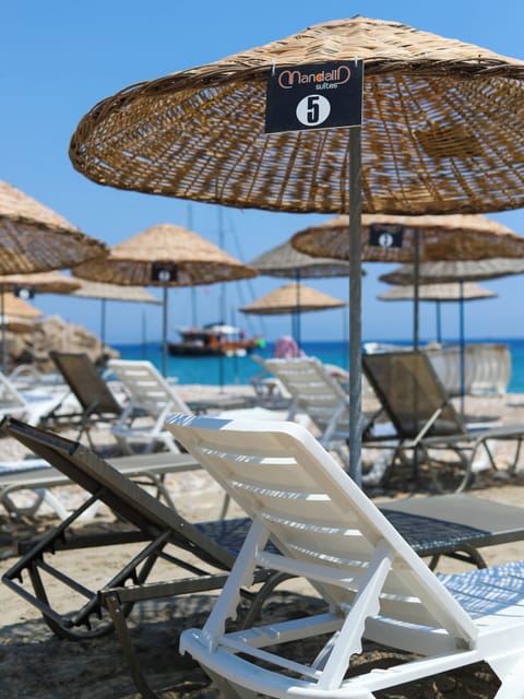 Sun loungers, beach umbrellas
