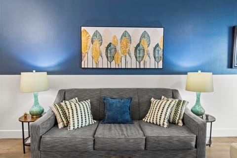 Inviting living room with a comfortable and snug couch. 
