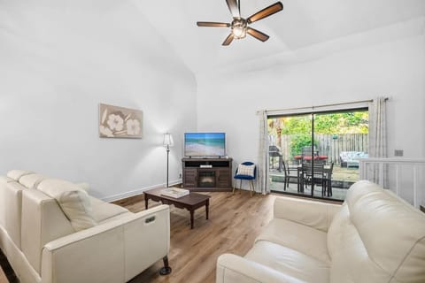 Spacious living and comfy seating with access to the patio