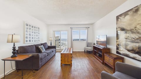Living area with comfy furnishings, balcony access and sleeper sofa (sleeps 2)