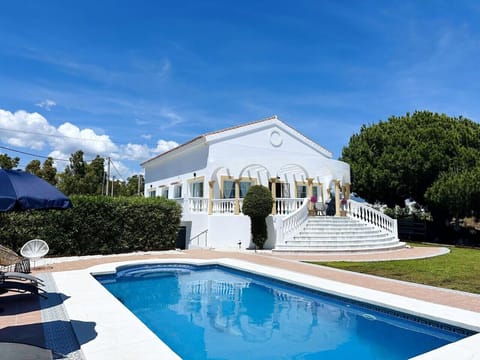The villa and pool from the garden