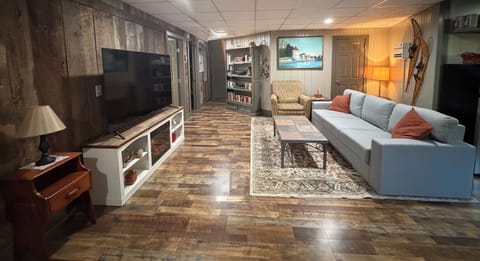 TV, Fireplace, books- a cozy spot